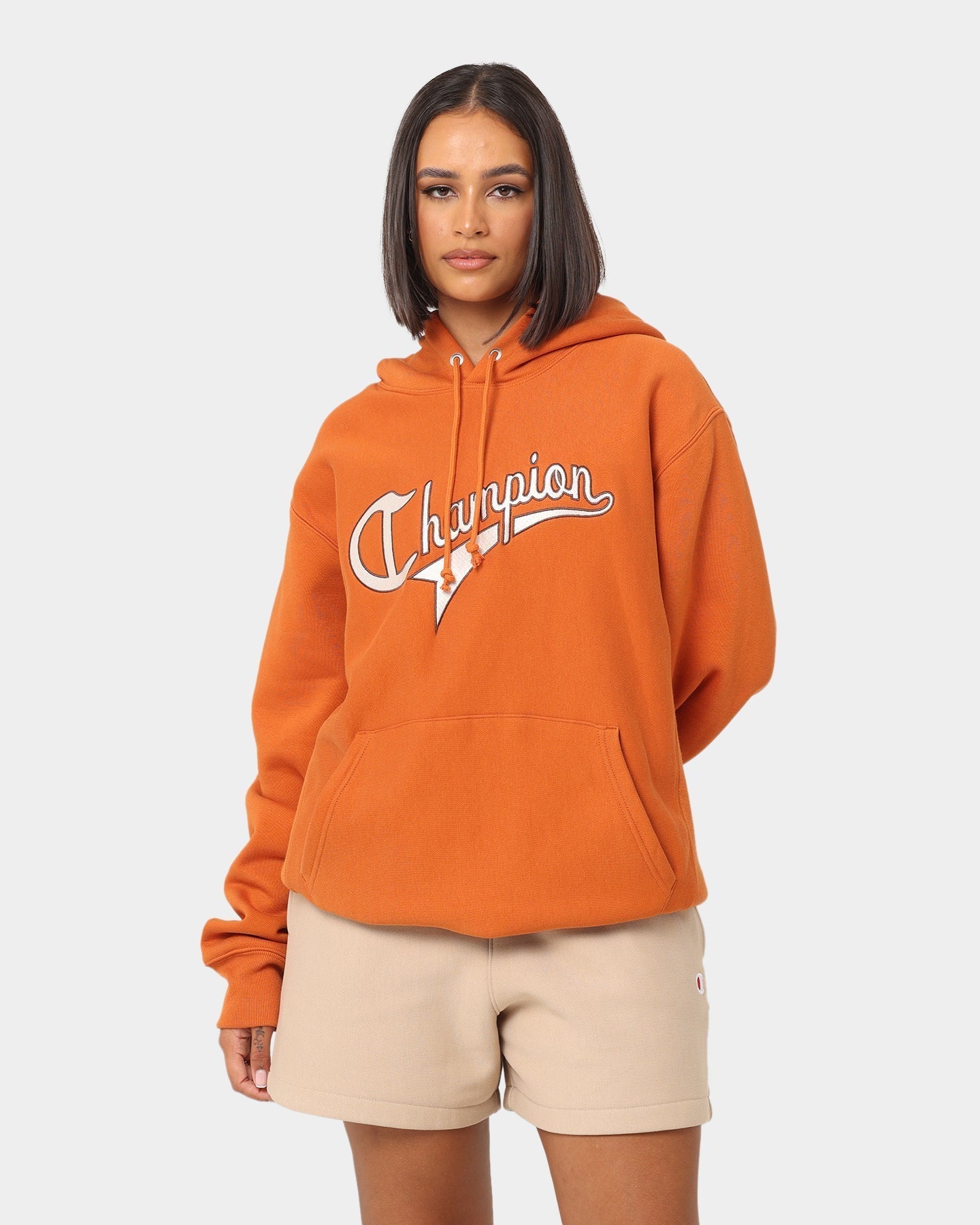 Champion ëmgedréint weave Cursive Logo Hoodie Kanéil Haze