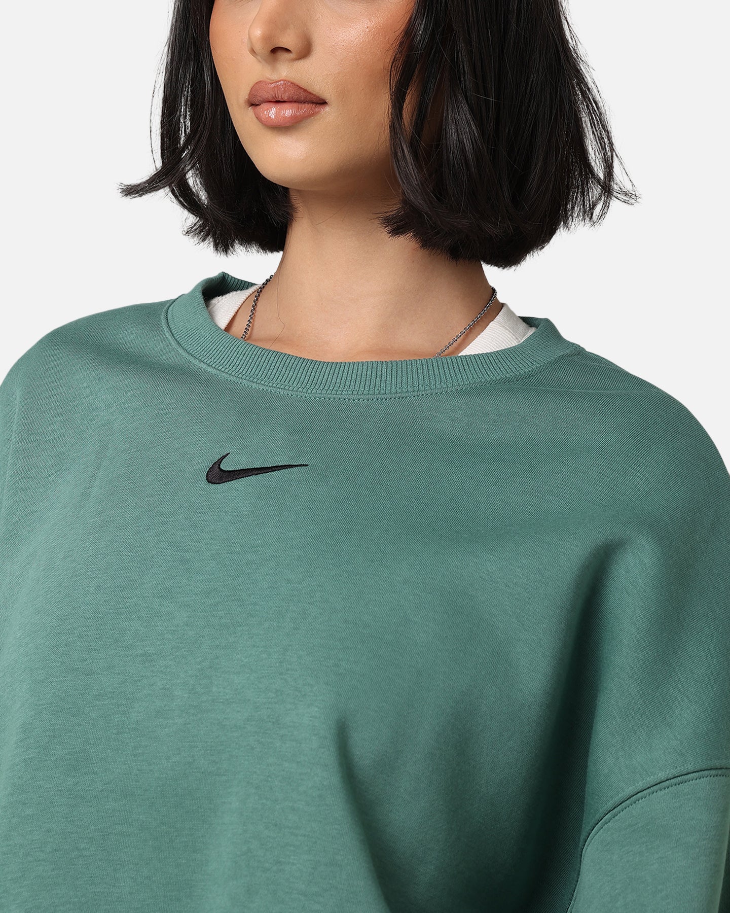 Nike Fraen Phoenix flüchten Crewneck Bicastal / Schwaarz