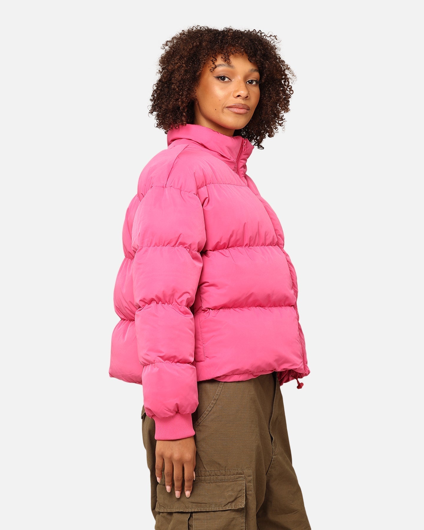 StÃ¼ssy graffiti bijgesneden puffer jas bubblegum