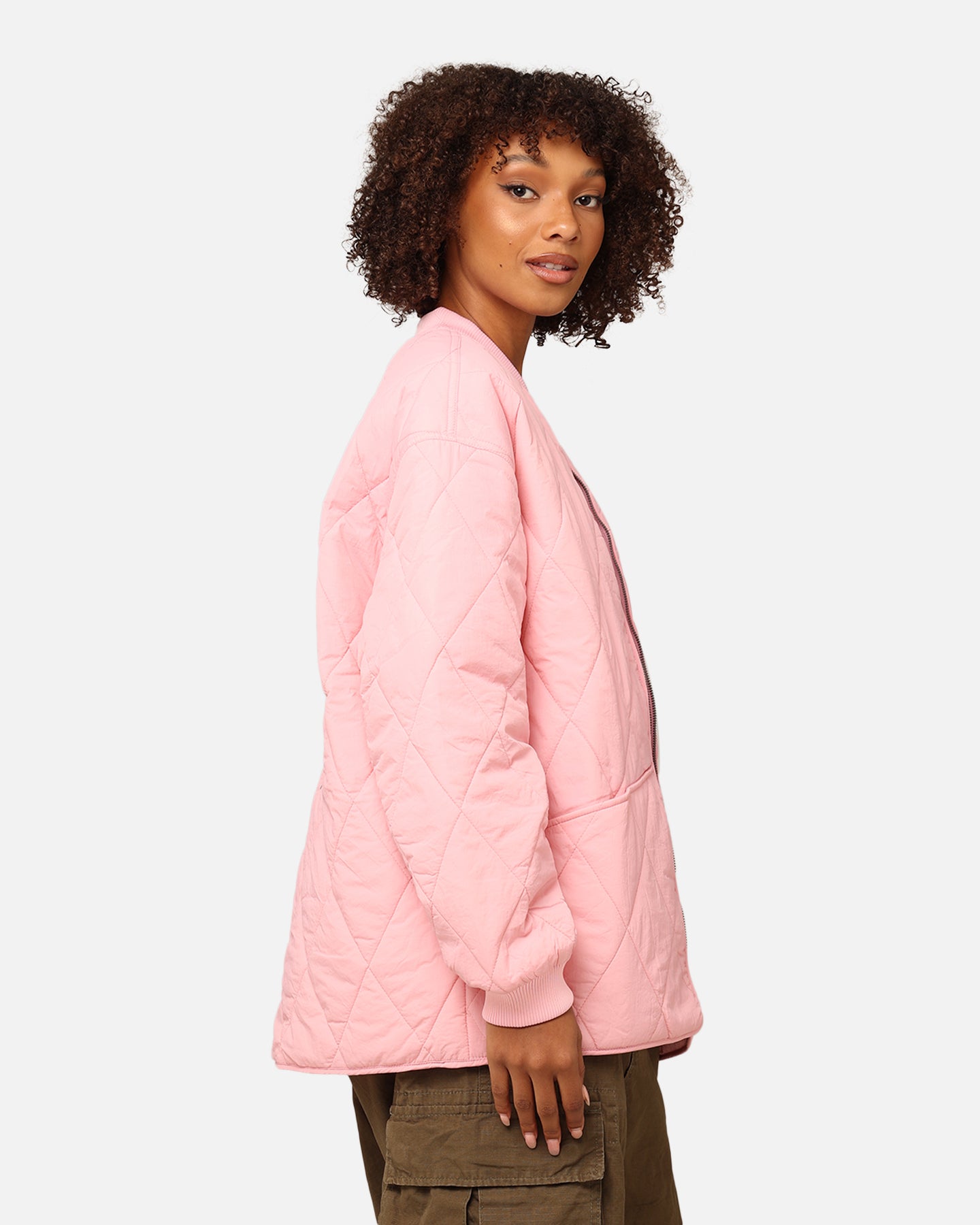 Veste matelasrée de la couronne de stock féminine en rose