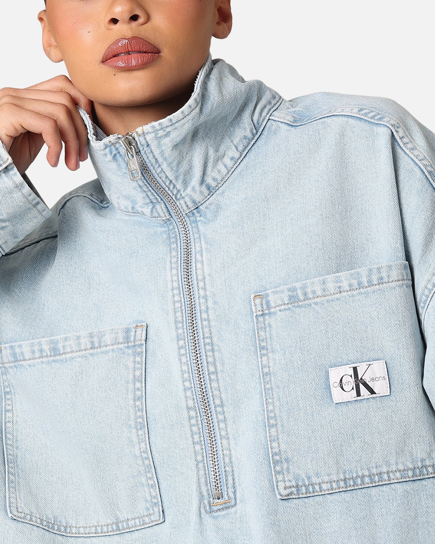 Calvin Kleein Denim Pop iwwer Véierel Zip Jackett Liicht