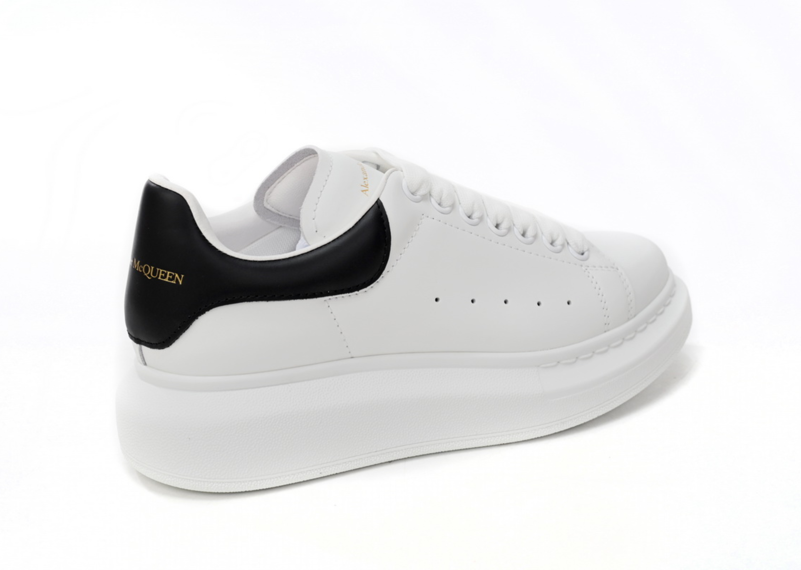 Alexander McQueen överdimensionerad sneaker vit svart