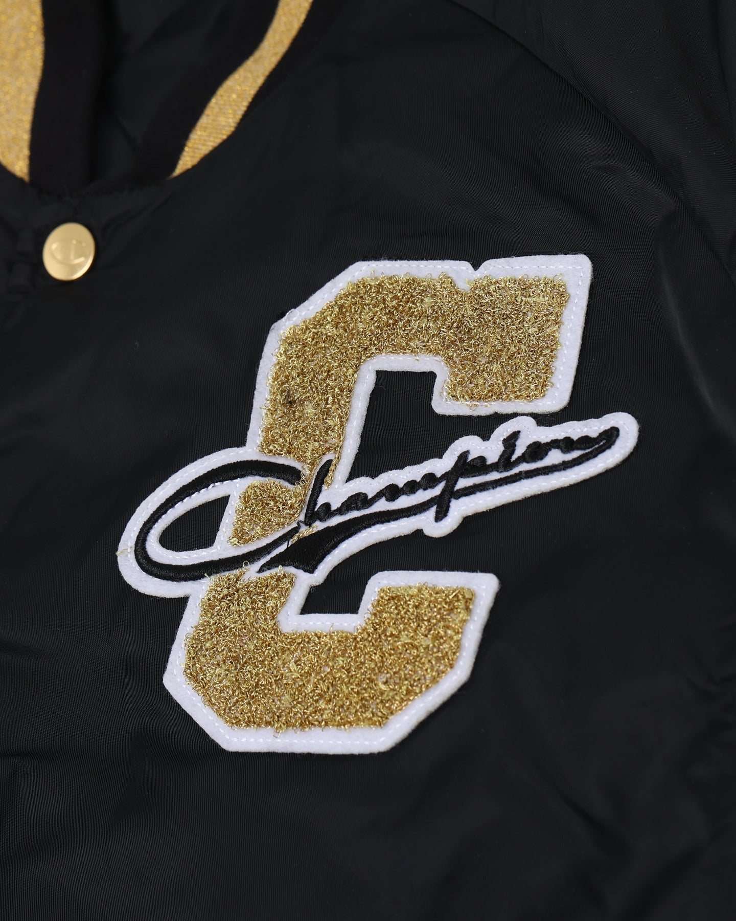 Champion LFS Letterman Jacke schwarz/gold